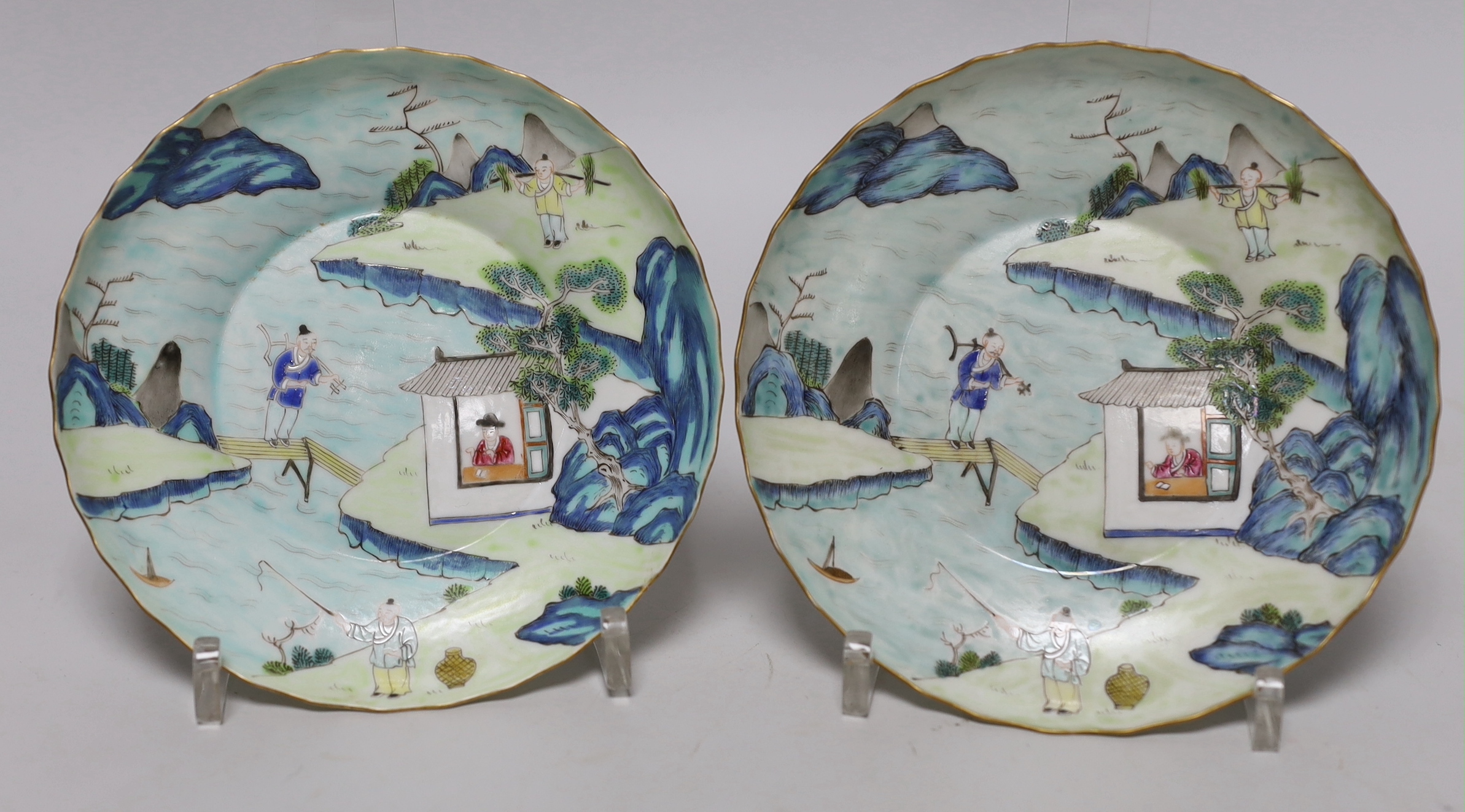 A set of four Chinese enamelled porcelain saucers, 13cm